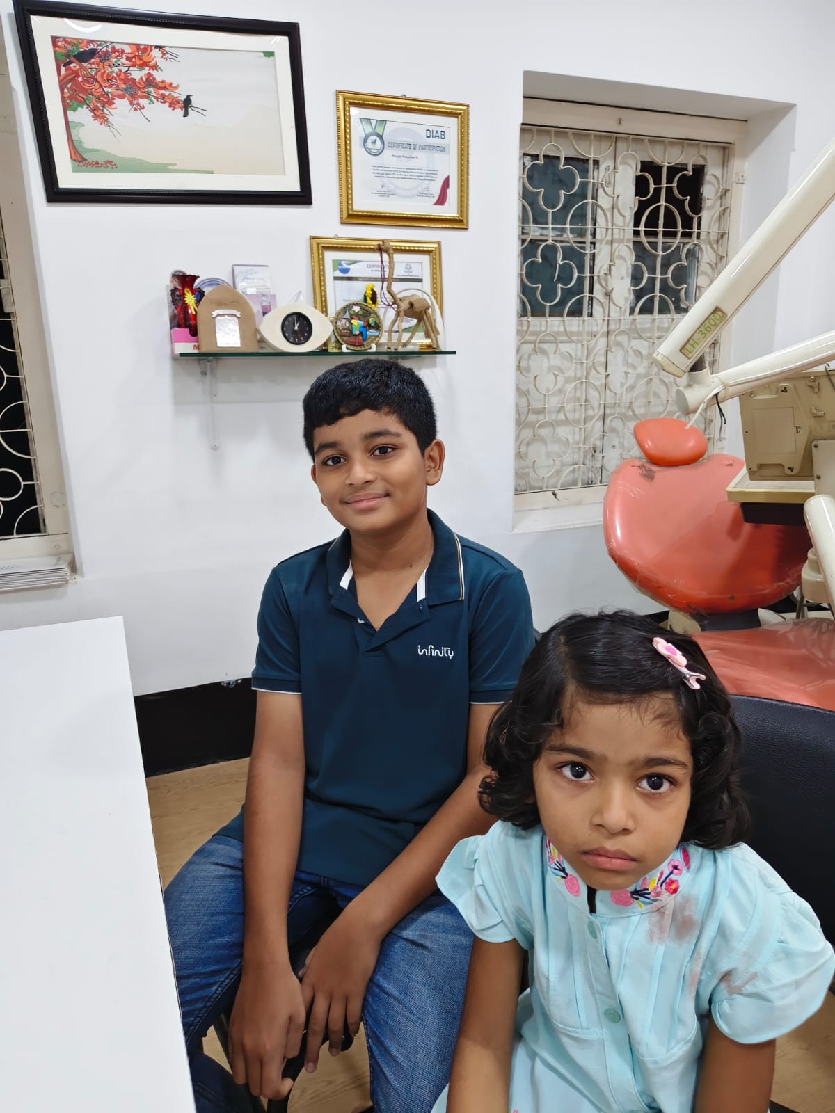 Dr. Nusrat Naiem with patients — Digital Dental Zone